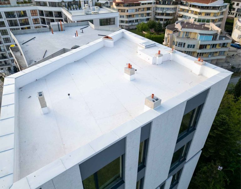 Can You Coat Over an Existing Flat Roof in Florida? The Decision Criteria for PBC Properties